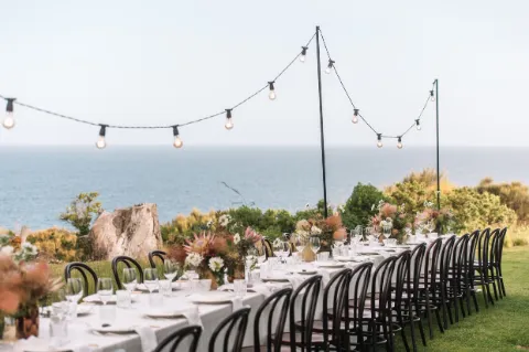 Wedding table overlooking Great Oyster Bay at Avalon Coastal Retreat