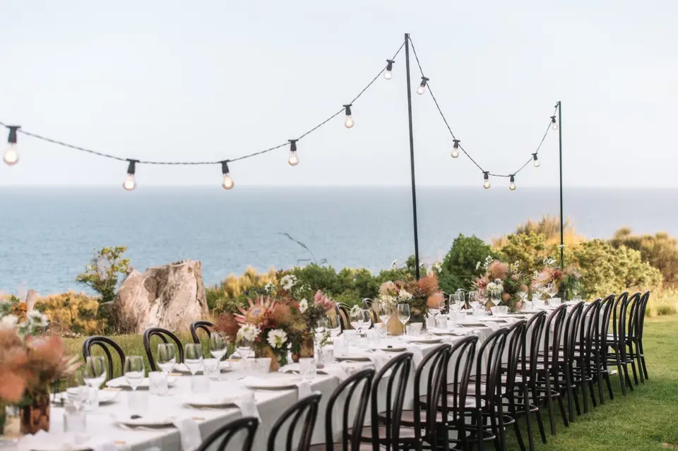 Wedding table overlooking Great Oyster Bay at Avalon Coastal Retreat